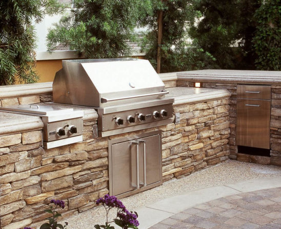 eldorado outdoor kitchen with stone base and granite countertops