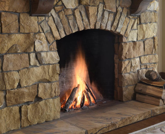 superior clay rumford fireplace with natural stone feel