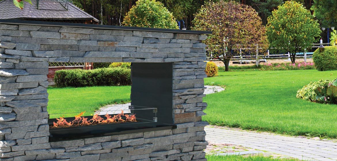 firegear outdoors key west natural gas or propane see through outdoor fireplace with natural stone veneer