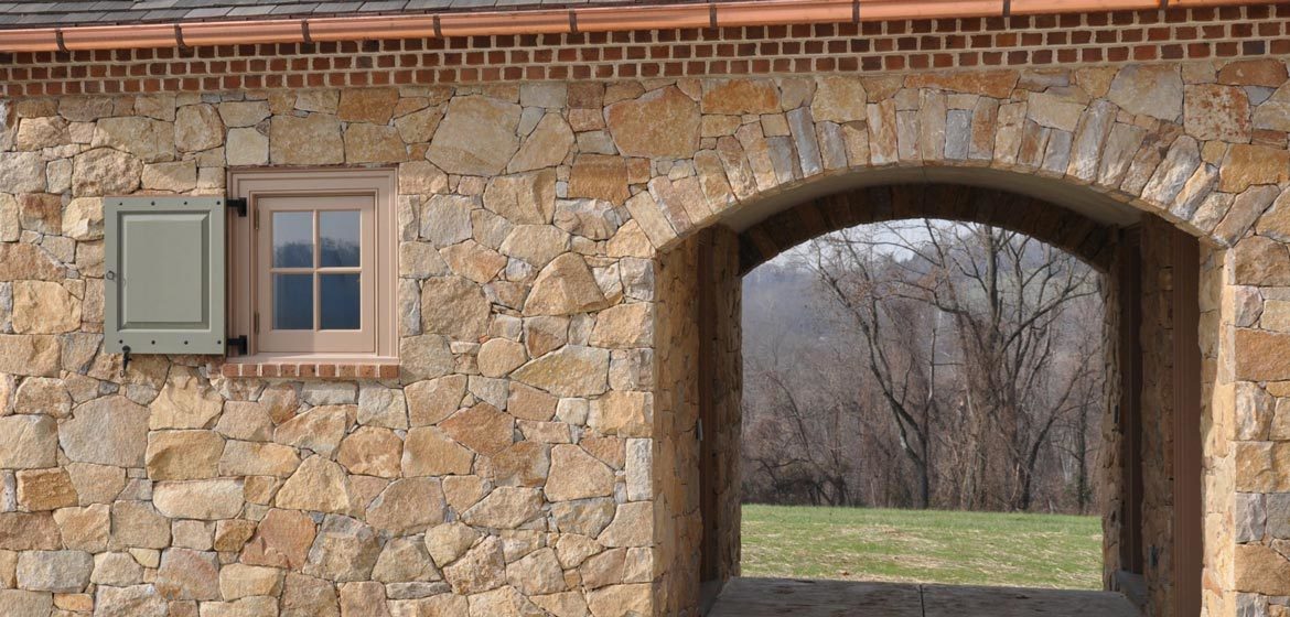 rolling rock building stone brookfield buff natural thin stone veneer barn breezeway